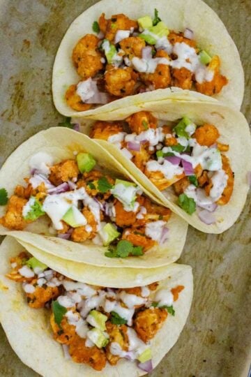 Vegan Buffalo Cauliflower Tacos with Dairy-free Ranch Drizzle