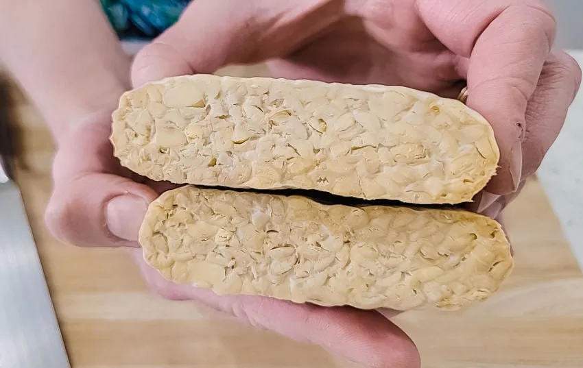 Tempeh block cut in half